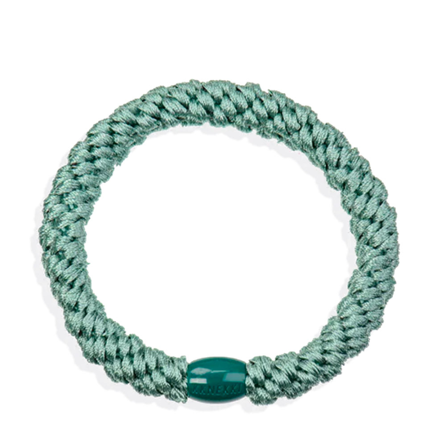 verblasstes-grunes-haargummi verblasstes-grunes-haargummi