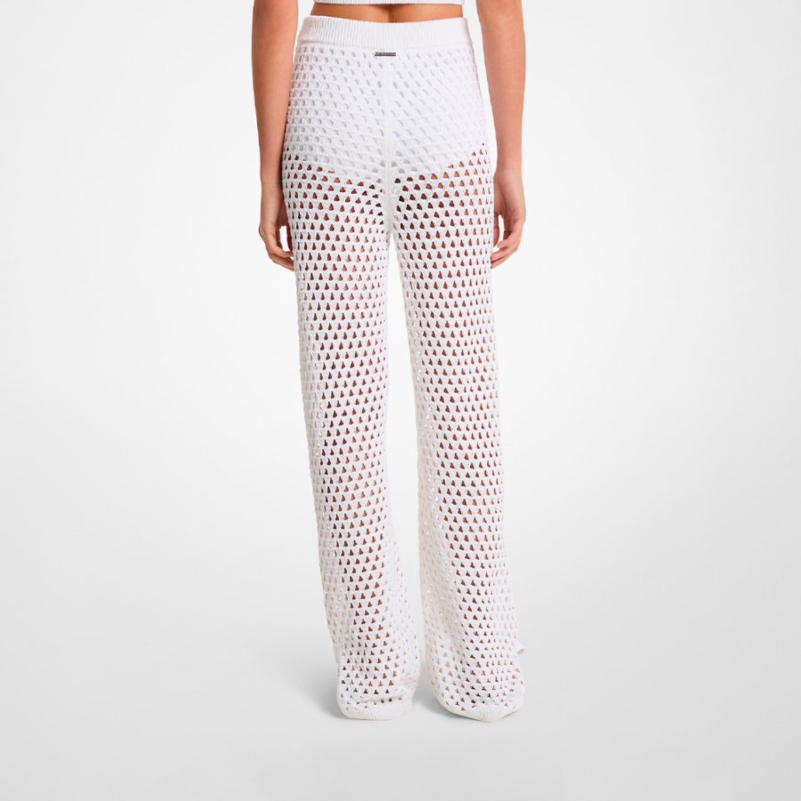 pantaloni-a-zampa-in-cotone-elasticizzato-a-maglia-aperta