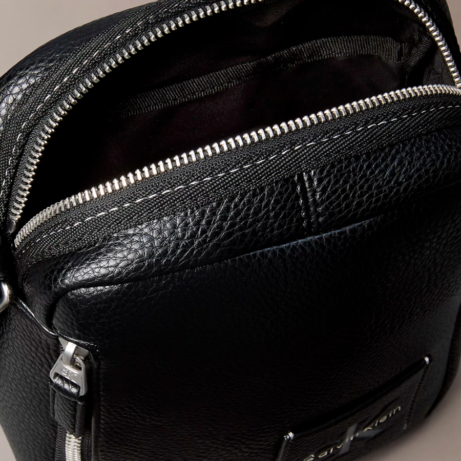 bolso-reporter-logo-monograma